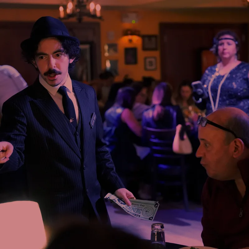 A detective questioning a guest at a San Jose show