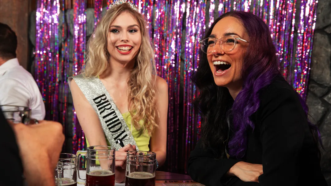 Guests celebrating at a San Jose murder mystery party